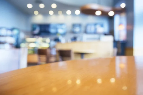 Table top Counter with Blur Restaurant cafe interior — Stock Photo, Image