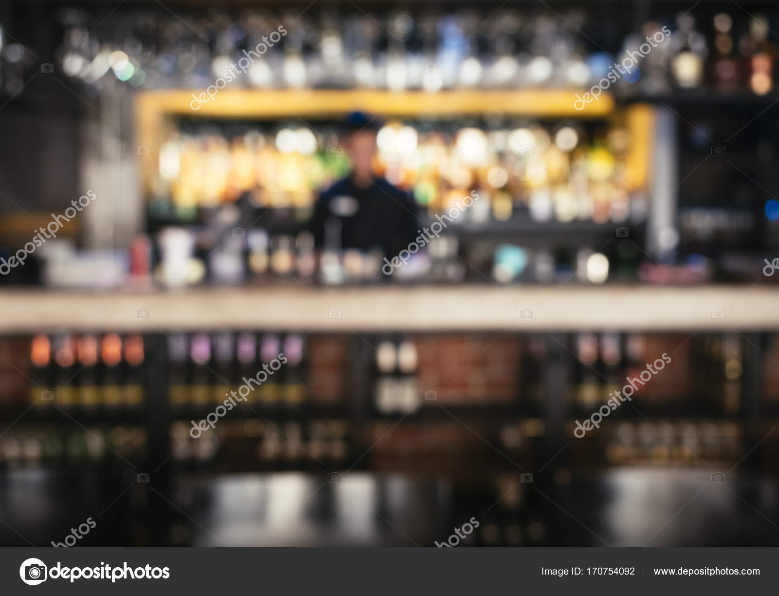 Bartender with blur Bar shelf background Nightlife party Stock Photo by  ©viteethumb 170754092