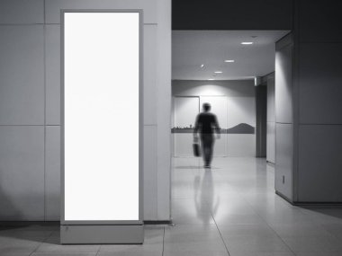 Blank vertical Banner Light box stand Public building with blur people walking clipart