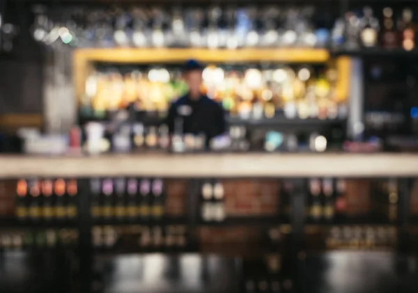 Bartender with blur Bar shelf background Nightlife party — Stock Photo, Image