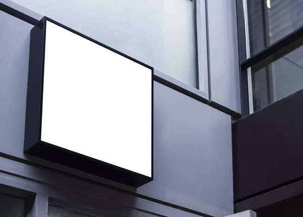 Vysmívat se exteriér přední displej budovy Shop znamení černý rám — Stock fotografie