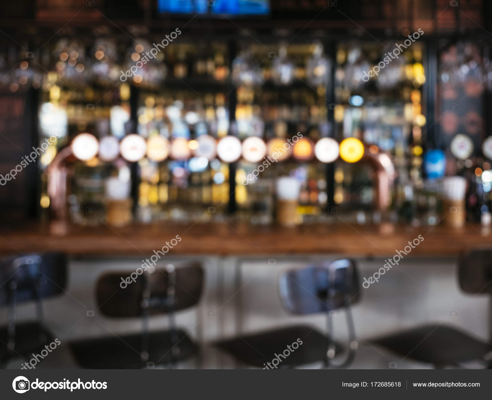 Blur Bar counter with seats stool Restaurant pub background Stock Photo by  ©viteethumb 172685618
