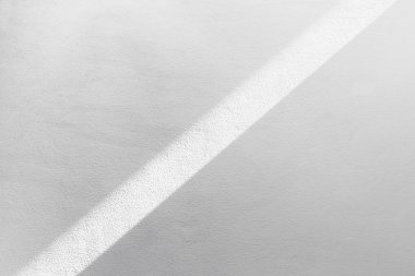 Gölge doku arka plan aydınlatma ile beyaz çimento duvar