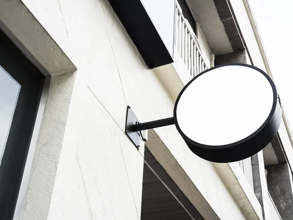 Mock up Signage shop sign Round shape hanging on building