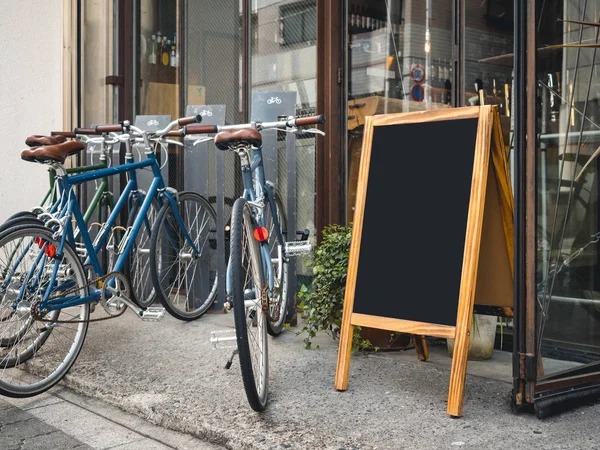 Mock up chalkboard Bicycle rental Shop Sign stand Outdoor — Stock Photo, Image