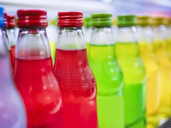 Sweetener Beverage bottles Colourful drinks on supermarket shelf