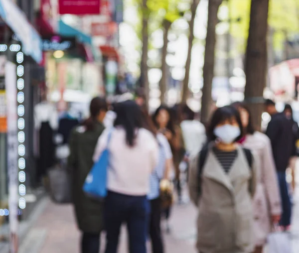 People wear mask walking on city street Korea Blur Asian people