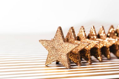 Grup dokulu parlak, altın yıldız