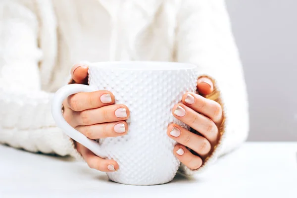 Woman with cup of hot coffee — Stock Photo, Image