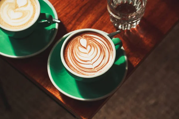 Cup of cappuccino with latte art — Stock Photo, Image