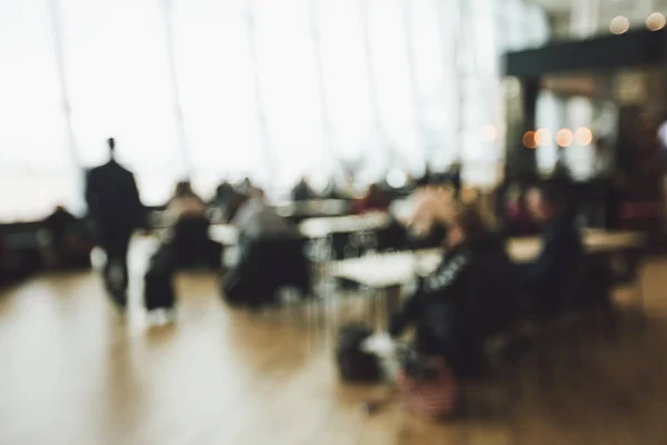 Blurred background of people in airport — Stock Photo, Image