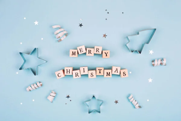 Text Merry Christmas on blue background
