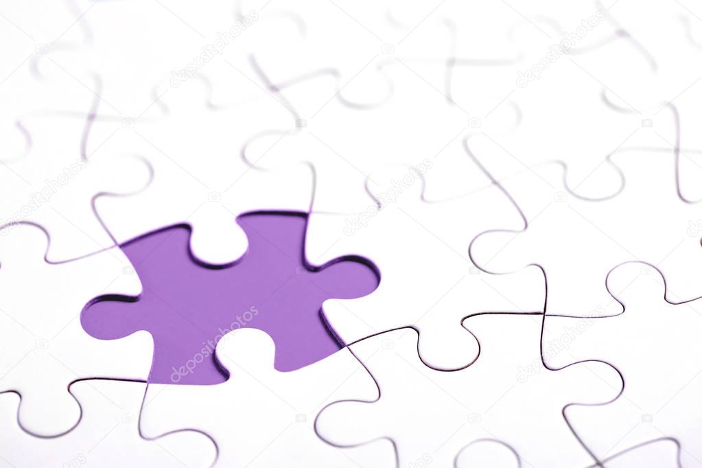 White puzzle with missing part on Ultra Violet background. Business concept