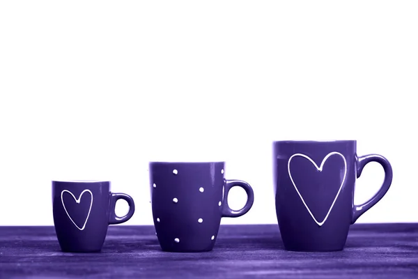 Três xícaras de café vermelho — Fotografia de Stock