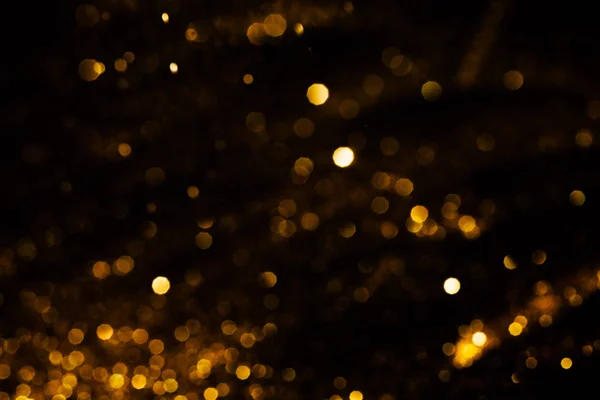 Splash of golden sparkles — Stock Photo, Image