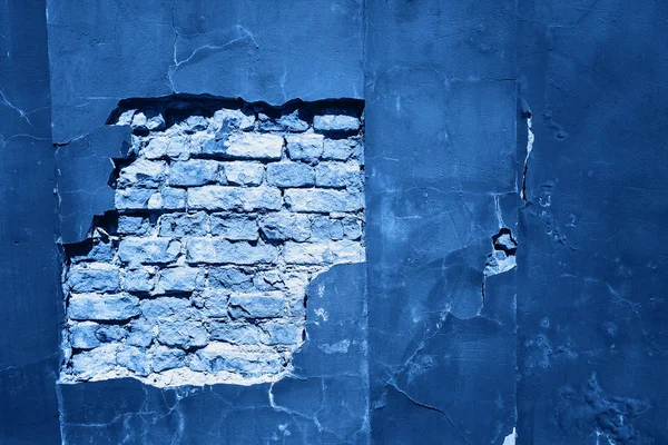 Gebarsten en getextureerde blauwe muur — Stockfoto