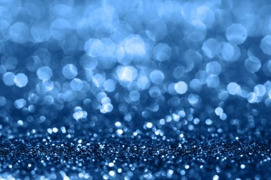 Mavi parlak soyut arkaplan.