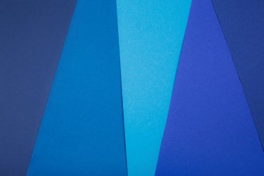 Birkaç parçaya bölünmüş mavi kağıt arkaplan