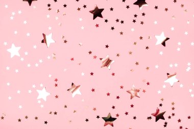 Altın yıldız, pembe arka plan glitter.