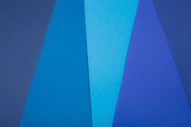 Birkaç parçaya bölünmüş mavi kağıt arkaplan