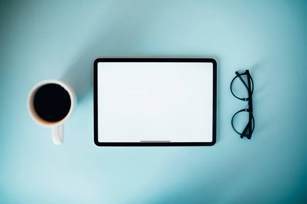 Digital tablet on blue — Stock Photo, Image