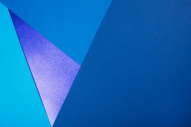 Birkaç parçaya bölünmüş mavi kağıt arkaplan