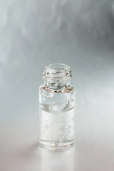 Macro photo of bottle with collagen — Stock Photo, Image