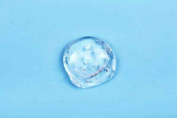 Abstrich Von Transparentem Gel Auf Blauem Hintergrund Virenschutz Oder Kosmetikkonzept — Stockfoto