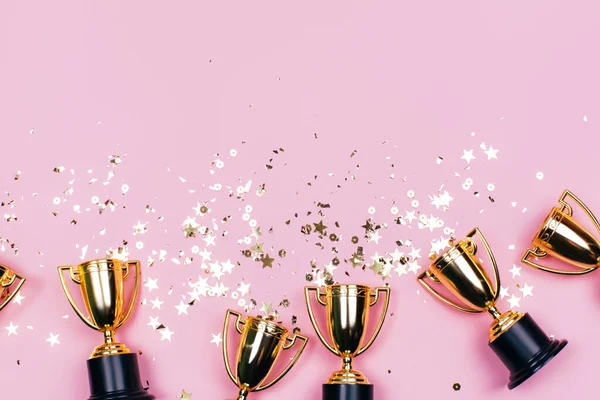 Golden Winner Cups Sparkles Pink Background Copy Space Festive Concept — Stock Photo, Image