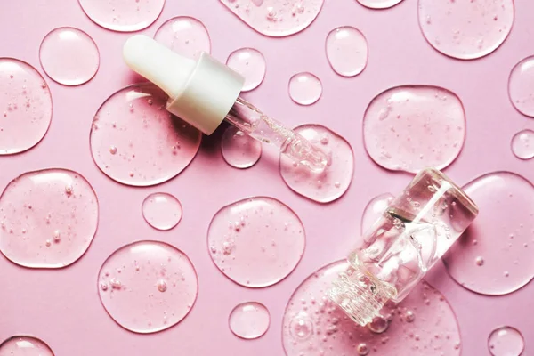 Gel Líquido Gotas Suero Con Pipeta Sobre Fondo Rosa Macro — Foto de Stock