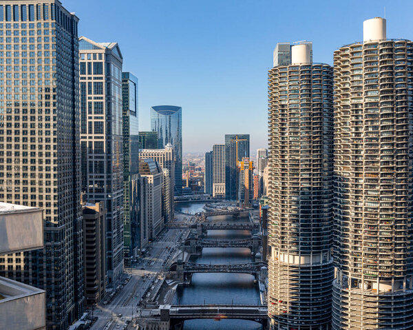Dramatic view of Chicago's diverse architecture, looking west along the Chicago River and West Wacker Drive.