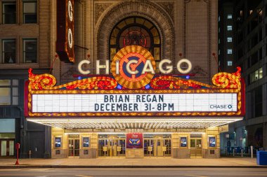 Chicago, USA - December 30, 2018:  Iconic Chicago Theater on North State Street in Chicago seen at night.  The theater opened in 1921 and was renovated in the 1980's.  The theater is a famous landmark and emblematic of Chicago. clipart