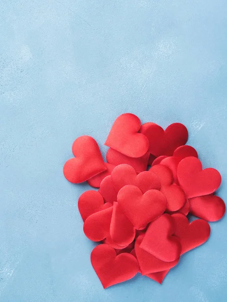 Red hearts on textured background — Stock Photo, Image