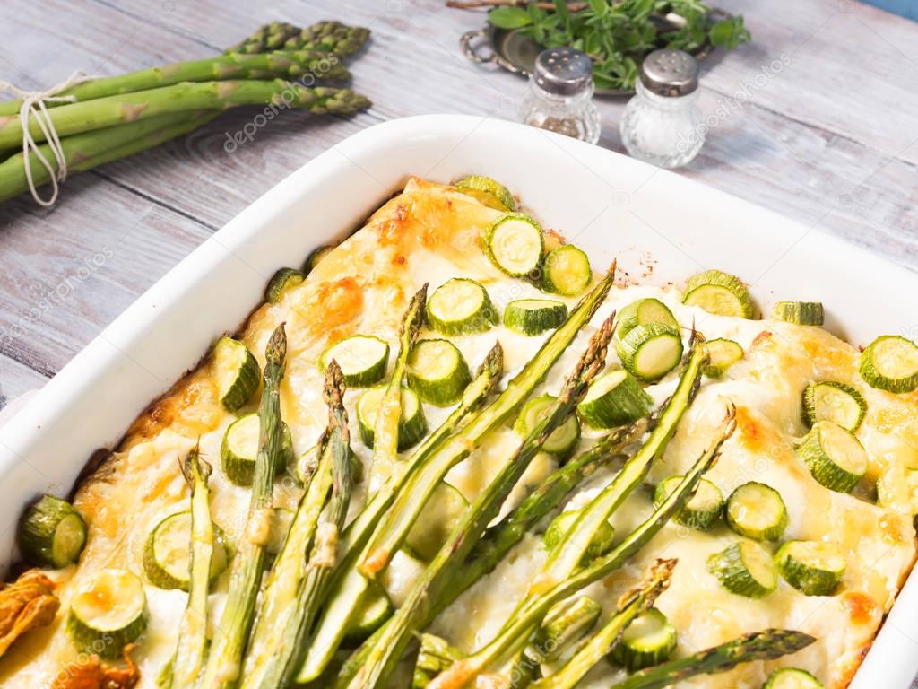 Asparagus lasagna casserole with courgettes and ricotta