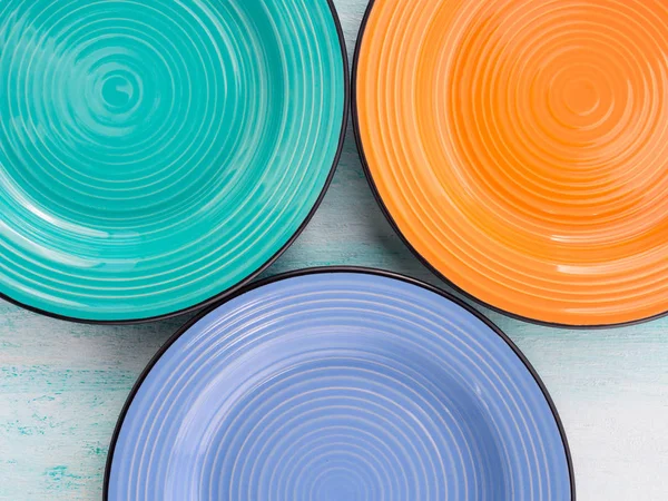 Παστέλ χρώμα κεραμικό πιάτο πιάτο κάτοψη φόντου — Φωτογραφία Αρχείου