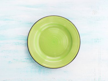 Pastel renkli seramik tabak çanak üstten görünüm arka planı