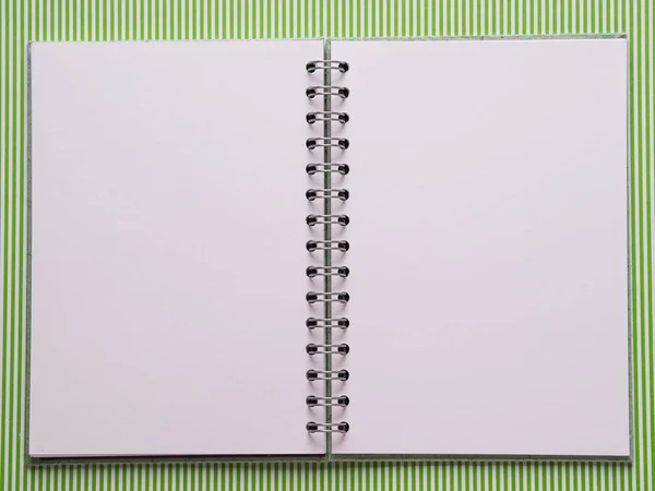 Open notebook with white pages