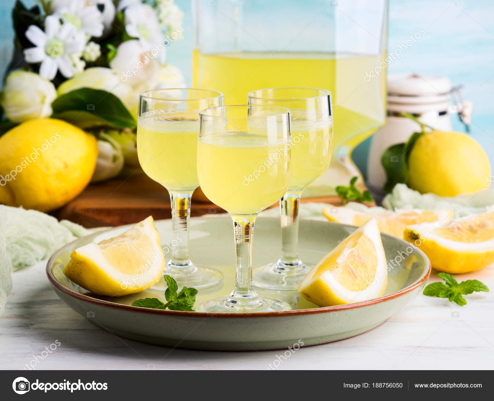 Home made limoncello in stemmed glasses Stock Photo by ©tenkende 188756050