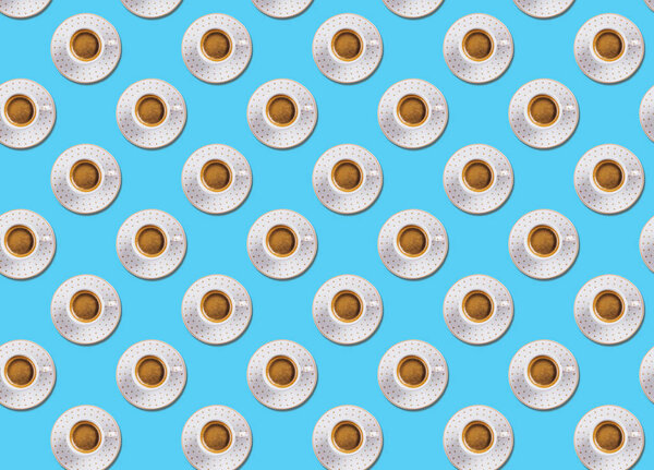 Cup of espresso coffee flat lay pattern on blue