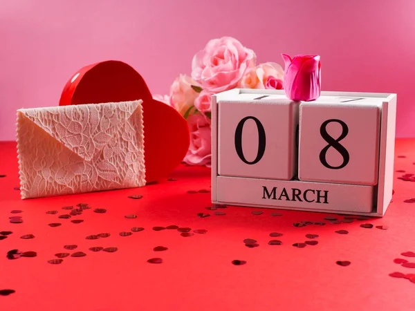 Concepto de día festivo para mujer con calendario de madera —  Fotos de Stock