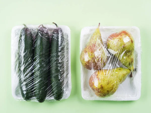 Fresh produce wrapped in plastic film. — Stockfoto