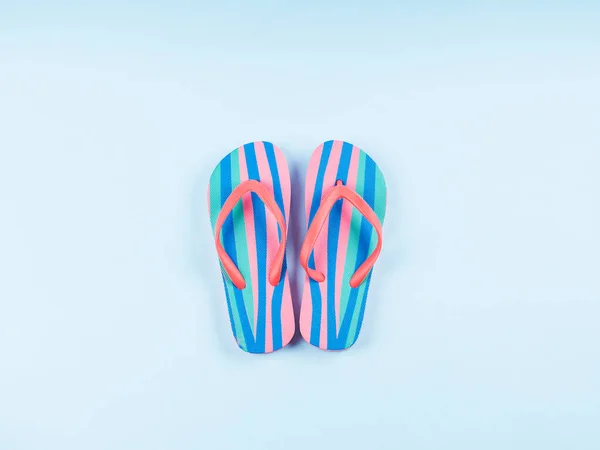 Summer flip flop pair on blue background — Stock Photo, Image