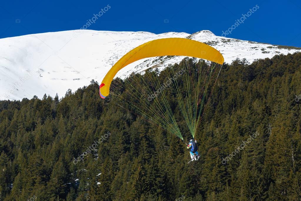 Speed flying on a small, fast fabric wing done on skis