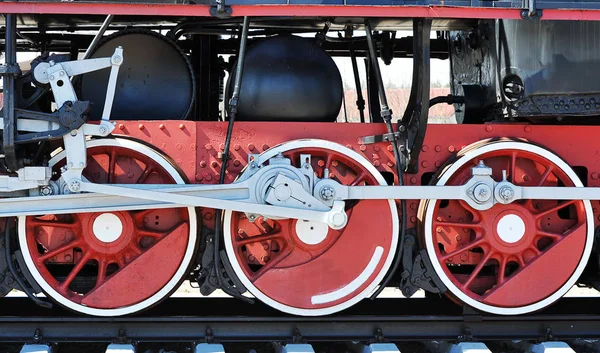 Red wheels of old steam locomotive — Stock Photo, Image