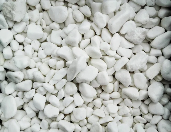 Pile  of white naturale    stones used to decorate the garden or parts of the house indoor or outdoor — Stock Photo, Image