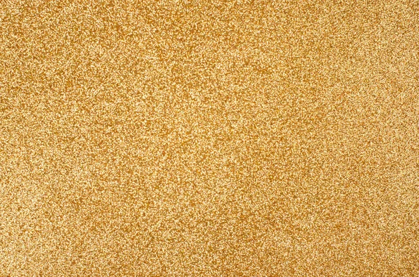 Close-up de fundo dourado brilhante. Vista superior, copyspace  . — Fotografia de Stock