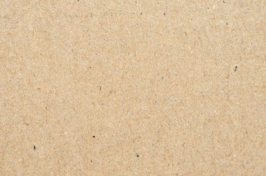 Kahverengi kağıt işçiliğinin arka planında, Top view 'de, düz yerde. Hediye kağıdı .