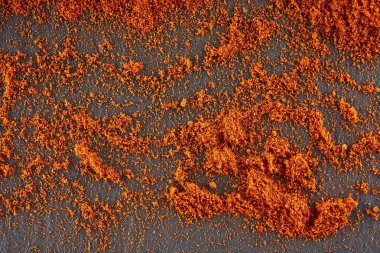 Doku arka plan. Kırmızı biber biber tozu. Üstten Görünüm