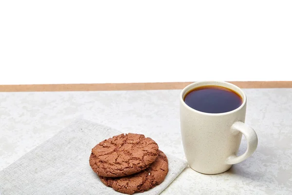 Close-up white cup of coffee with chocolate chip cookies on white background, top view — Stock Photo, Image
