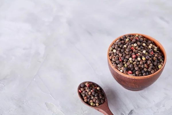 Seasoning - four kinds of pepper peas - isolated on white background